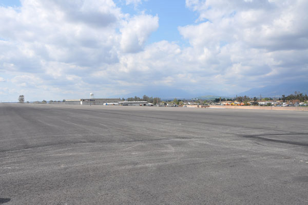 The Air Force applied a protective soil cap to the former landfill, approximately 20 acres large, as part of the cleanup at the former Norton Air Force Base. Later the site was paved by the Local Redevelopment Authority for use as a parking lot