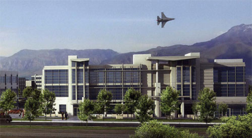 Image of building with aircraft overhead at Hill AFB