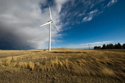 photo of a wind turbine in a field
